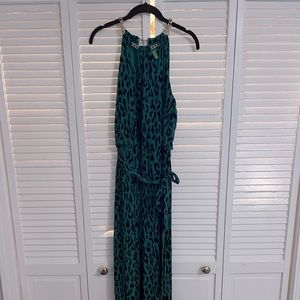 Green leopard jumpsuit with chain embellished neckline